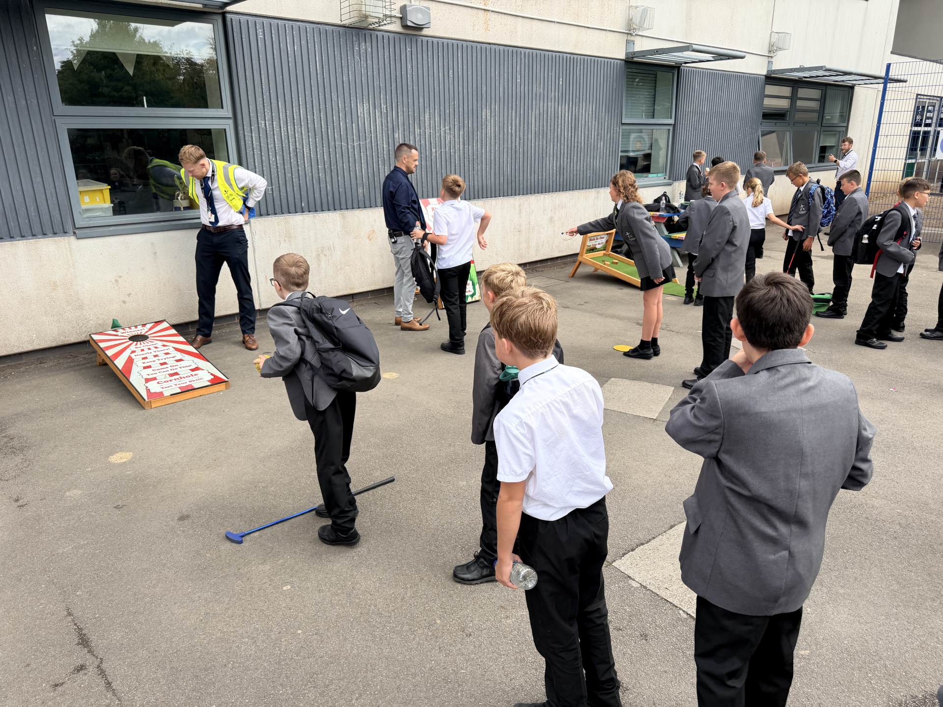 Year 7 students waiting to try a carnival target game