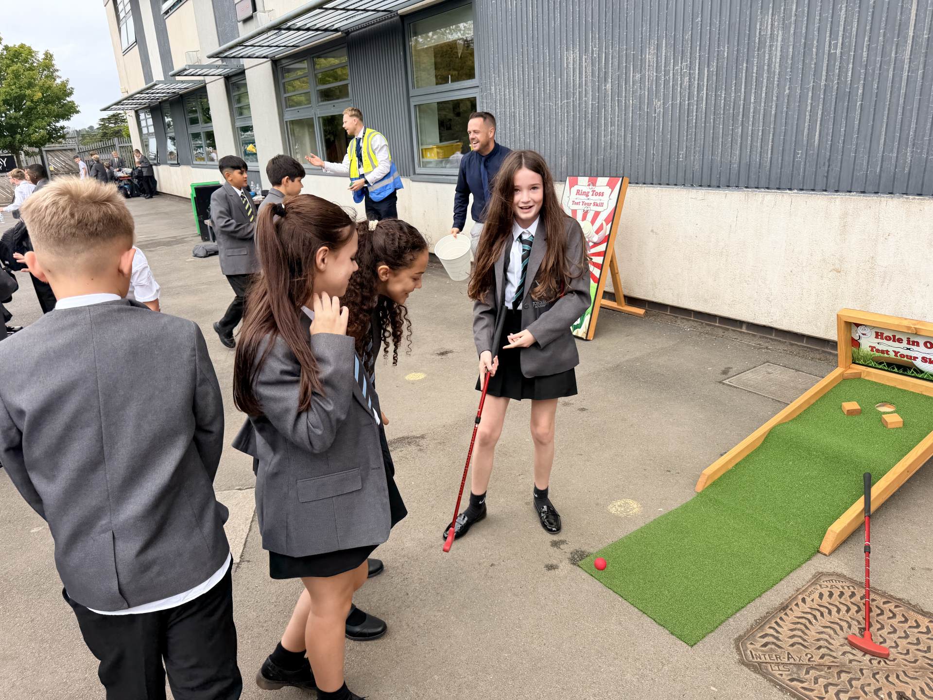 Year 7 students taking turns at the putting game