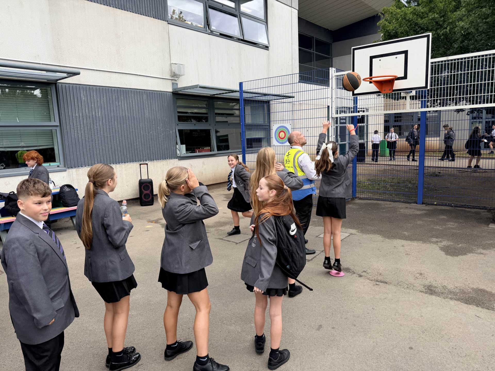 Year 7 students taking part in the basketball shooting activity
