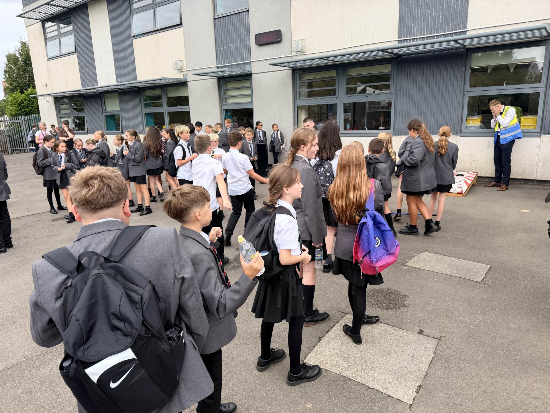 Year 7 students gathering around the Fun Friday games
