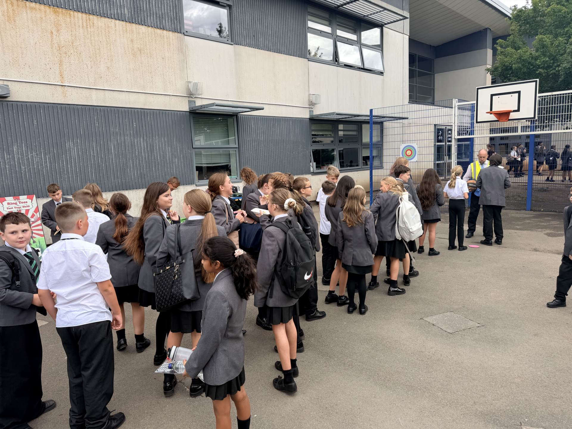 Year 7 students watching the basketball shooting activity