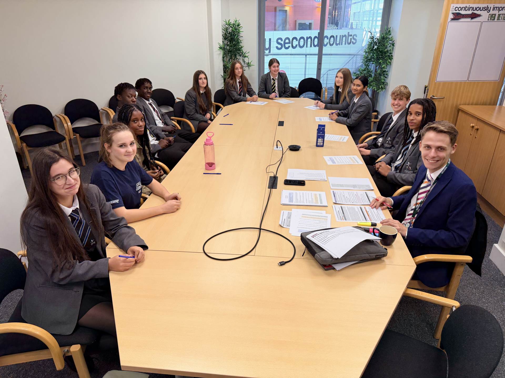 Kole Gjikolaj with Torquay Academy students during a youth wellbeing discussion